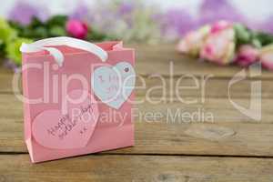 Pink gift bag with heart shape tag