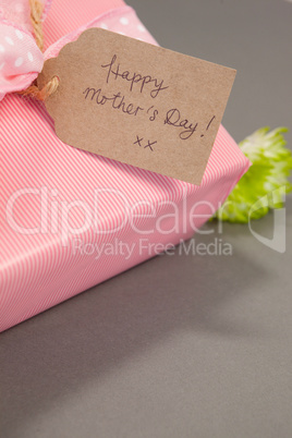 Close-up of gift box with happy mothers day card