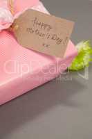 Close-up of gift box with happy mothers day card