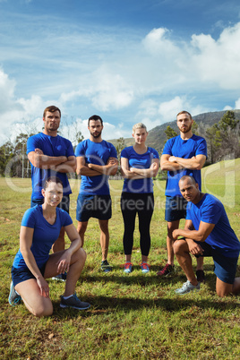 Fit people posing together