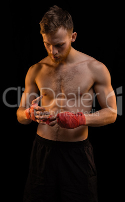 Boxer with red boxing bandages