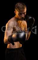 Young boxer man during workout