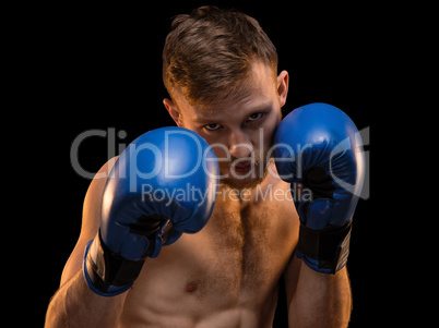 Bearded man with boxing gloves