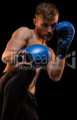 Young man with boxing gloves