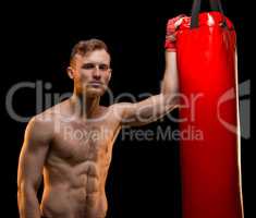 Boxer man with punching bag
