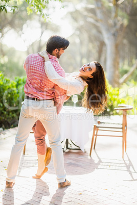 Couple dancing in the park