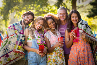 Group of friends standing together in park