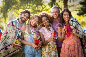 Group of friends standing together in park