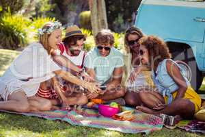 Group of happy friend taking a selfie in park