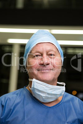 Portrait of smiling male surgeon