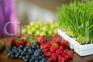 Fruits and herbs on the counter at health grocery shop