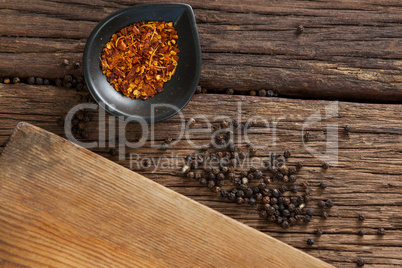 Rib rack on wooden board with spices