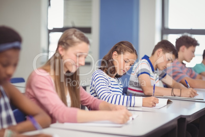 Students studying in classroom