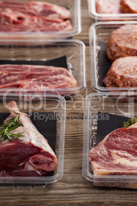 Varieties of meat in plastic boxes