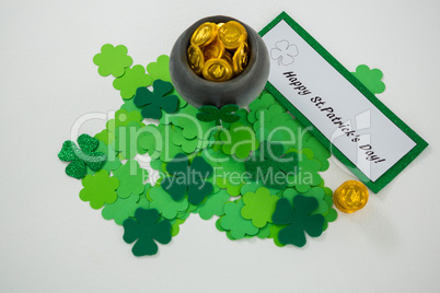 St. Patricks Day shamrocks and pot filled with chocolate gold coins