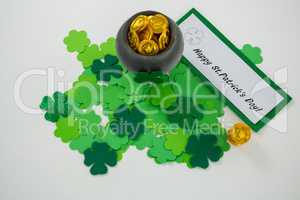 St. Patricks Day shamrocks and pot filled with chocolate gold coins