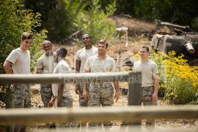 Military soldiers interacting with each other