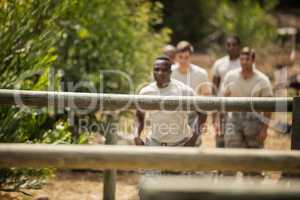 Military soldiers training on fitness trail