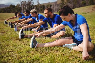 Fit people exercising in boot camp