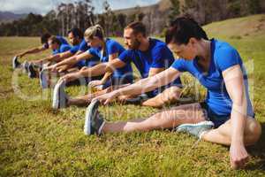 Fit people exercising in boot camp