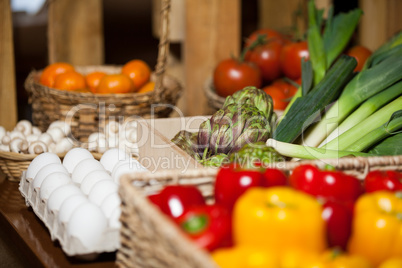Various fruits, vegetables and eggs in organic section