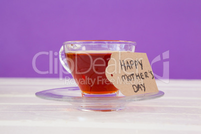 Happy mothers day card with cup of herbal tea