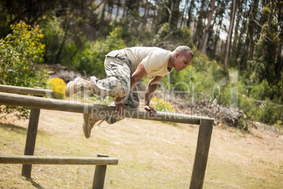 Military soldier training on fitness trail