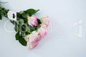 Bunch of pink roses with happy mothers day tag