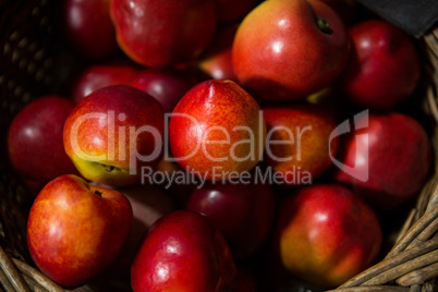 Close-up of wicker basket full of apple