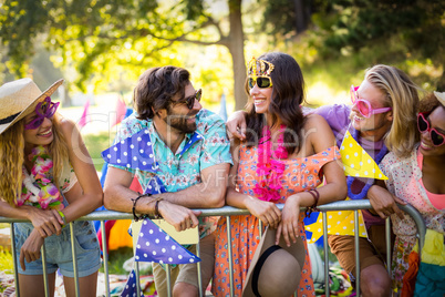 Group of friends standing together in park