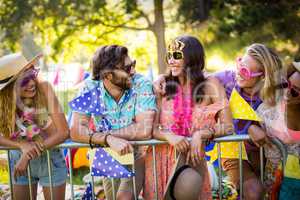 Group of friends standing together in park