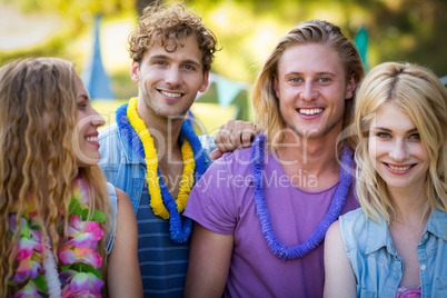 Group of friends standing together in park