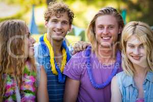 Group of friends standing together in park