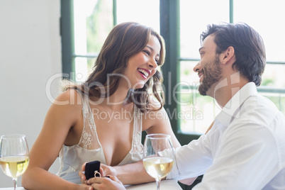 Couple smiling while looking at each other