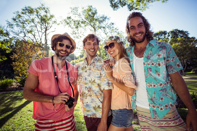 Group of friends having fun together in park