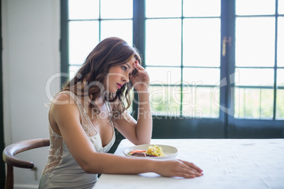 Depressed woman sitting