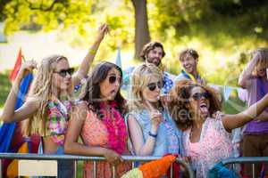 Friends clicking a selfie at music festival