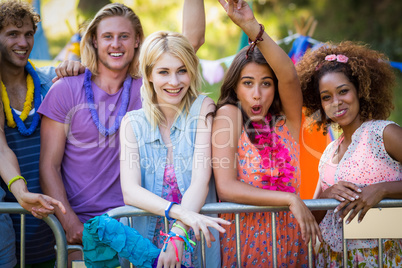 Group of friends standing together in park