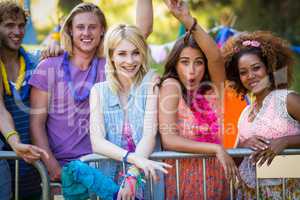 Group of friends standing together in park