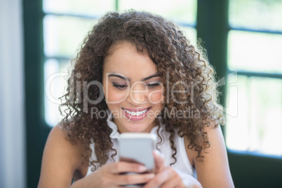 Beautiful woman using mobile phone