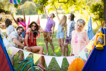 Friends having fun together at campsite