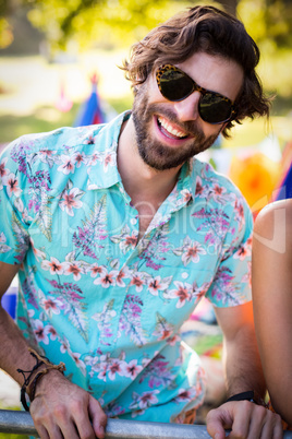 Man smiling in park