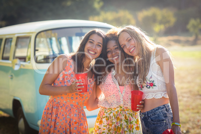 Portrait of female friends smiling