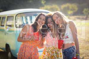 Portrait of female friends smiling