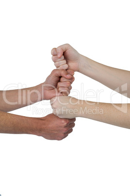 People stacking their fists