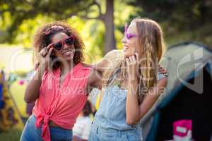 Friends having fun at campsite