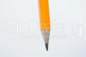 Yellow color pencil on white background
