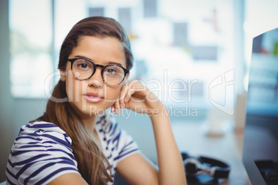 Portrait of female graphic designer in office