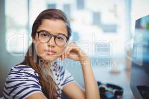 Portrait of female graphic designer in office