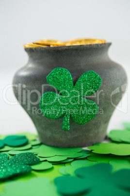 St. Patricks Day shamrocks and pot filled with chocolate gold coins